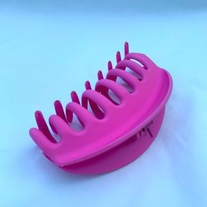 Pastel pink hair claw clip.